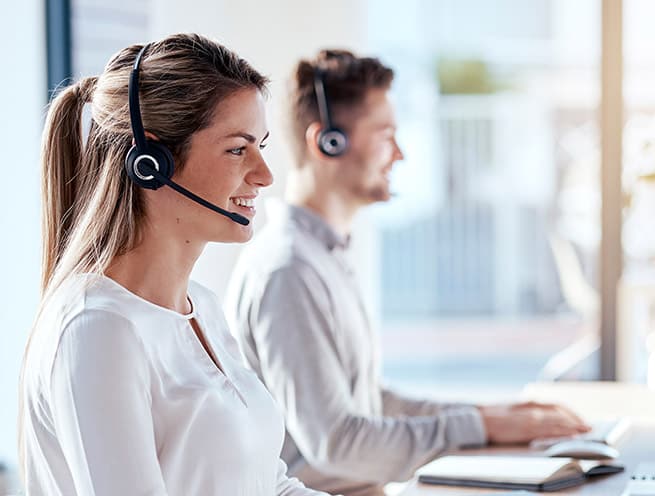 woman and man using emotional intelligence in a call center